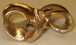 Bronze Pierced Mobius Band, Figure 3 by Alex J. Feingold