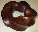Cocobolo Wood Torus Knot, Figure 2 by Alex J. Feingold