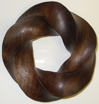 Claro Walnut Torus Knot, Figure 2 by Alex J. Feingold