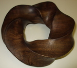 Claro Walnut Torus Knot, Figure 3 by Alex J. Feingold
