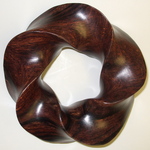 Cocobolo Wood (3,5) Torus Knot, Figure 5 by Alex J. Feingold