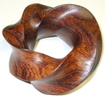Cocobolo Wood (4,5) Torus Knot. Figure 6 by Alex J. Feingold