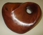 Purpleheart version of the Friedman Figure 8 Knot, made from a block of size 3"x6"x6" by Alex J. Feingold