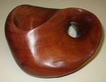 Purpleheart version of the Friedman Figure 8 Knot, made from a block of size 3"x6"x6" by Alex J. Feingold