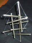 Tensegrity sculpture from 9 stainless steel rods and fishing line by Alex J. Feingold