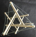 Tensegrity sculpture from 9 stainless steel rods and fishing line by Alex J. Feingold