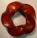 Padauk wood (3,5) torus knot, image 2 by Alex J. Feingold
