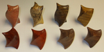 Eight small twist sculptures, various kinds of wood by Alex J. Feingold