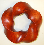 Torus Knot (3,5) Padauk wood, Figure 1 by Alex J. Feingold