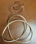 Trefoil Knots, bronze and copper wire by Alex J. Feingold