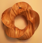 Torus knot (3,5) Olivewood. Figure 3 by Alex J. Feingold