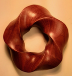 Torus knot (3,5) Purpleheart wood. Figure 2 by Alex J. Feingold