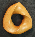 Torus Knot (2,3) Pau Rosa wood, Figure 4 by Alex J. Feingold